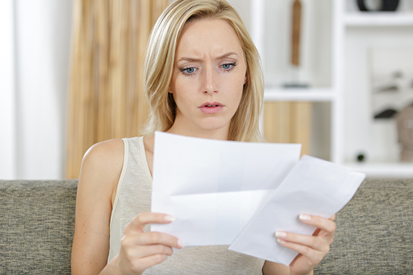 Why is a 'Paid' judgment appearing on my credit report as 'Not Satisfied'?